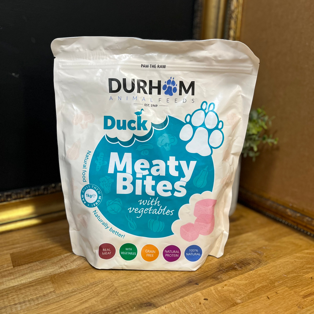 Package of Durham Animal Feeds Duck Meaty Bites on a wooden surface