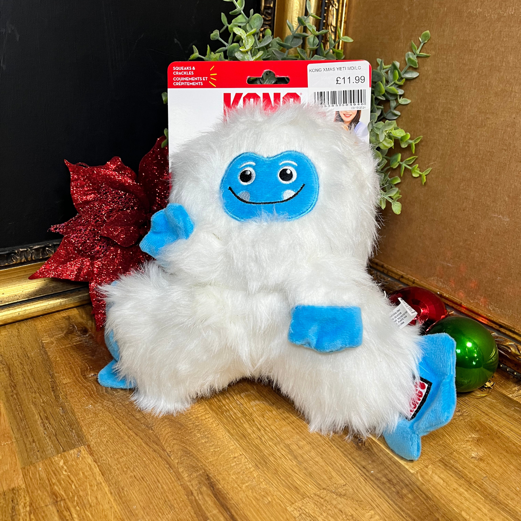 Plush abominable snowman dog toy with blue accents